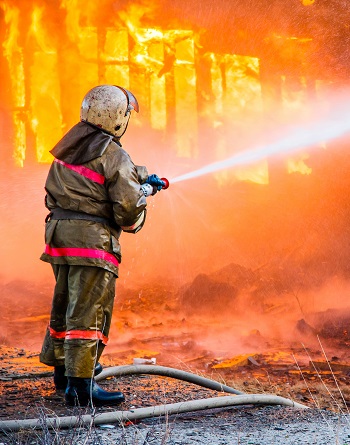 Fireman Extinguishes A Fire